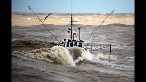 Fishing boats nearly capsize ...